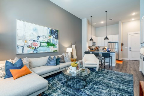 a living room with couches and a coffee table